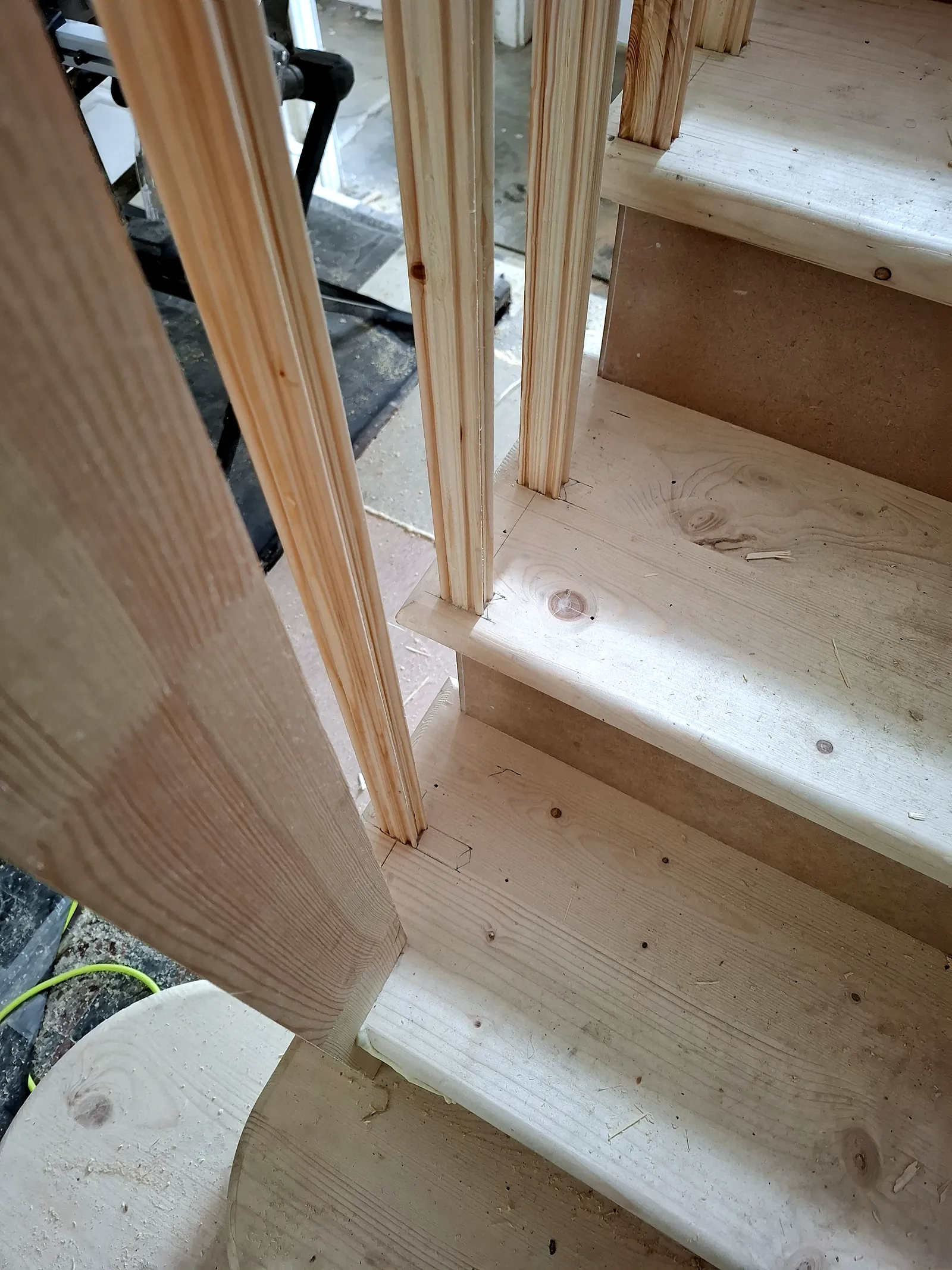 Close-up of new pine stair treads and spindles