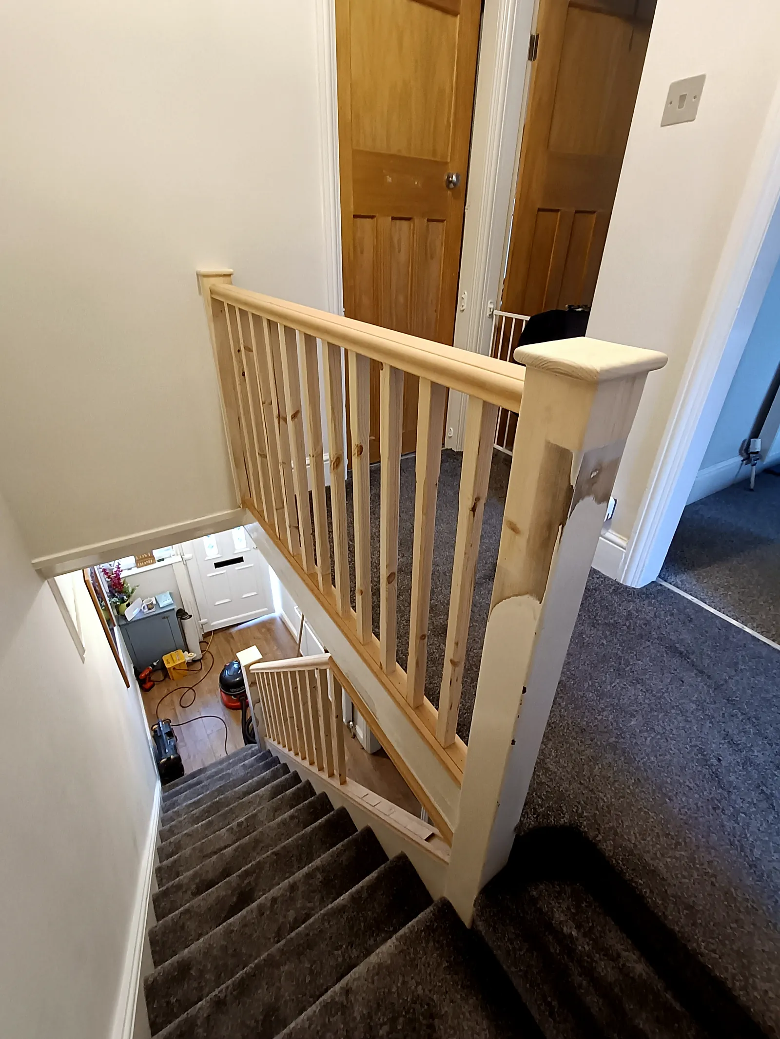 Landing balustrade with new spindles and newel post